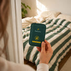 Hand holding a sealed CaptureCard in a naturally lit doorway