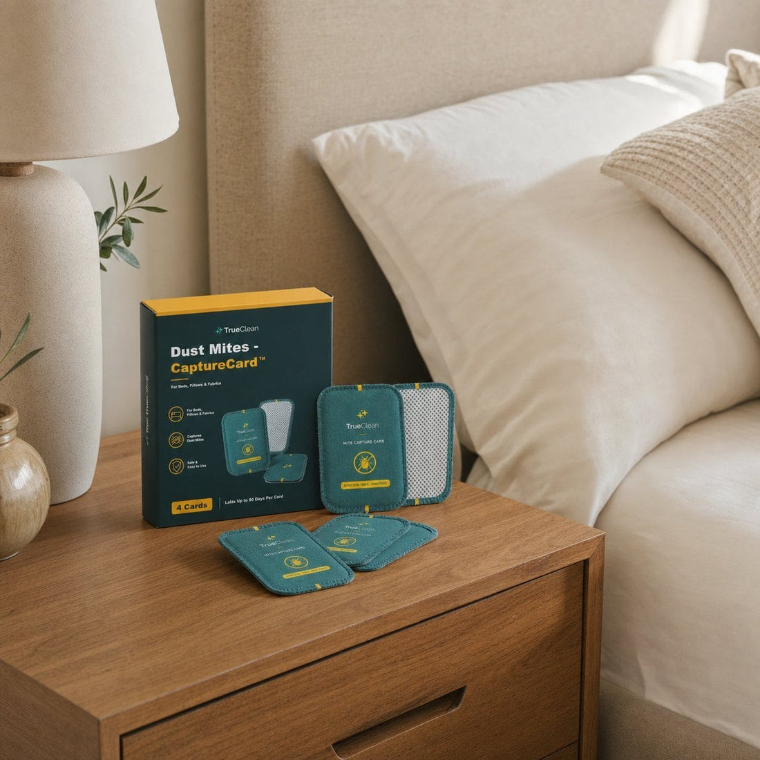 TrueClean CaptureCards placed beside bedding in a bedroom