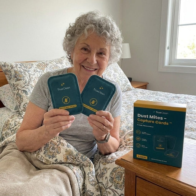 Customer holding two CaptureCards in the guest room