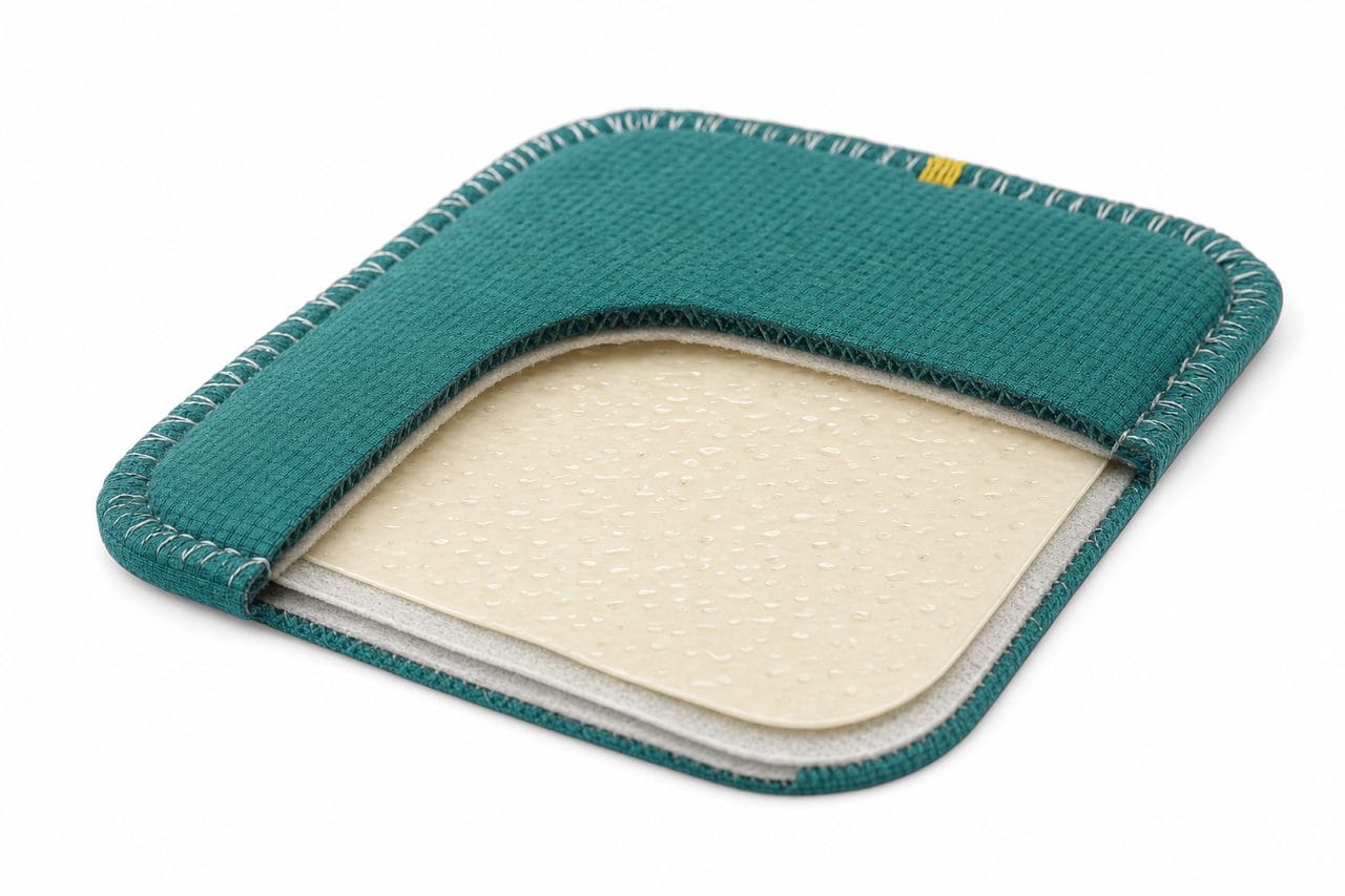Inside the CaptureCard: the fabric shell opened to show the adhesive catch sheet