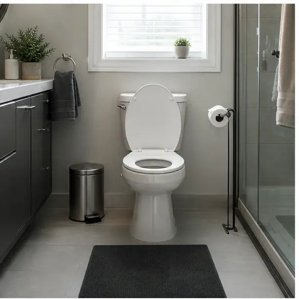 thumbnail — modern American suburban bathroom, white toilet front and center, almost ordinary-looking — implying "this could be your bathroom right now."