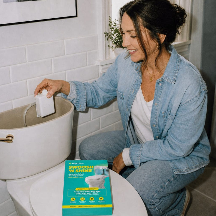 Installing the Swoosh 'N Shine unit on a toilet tank