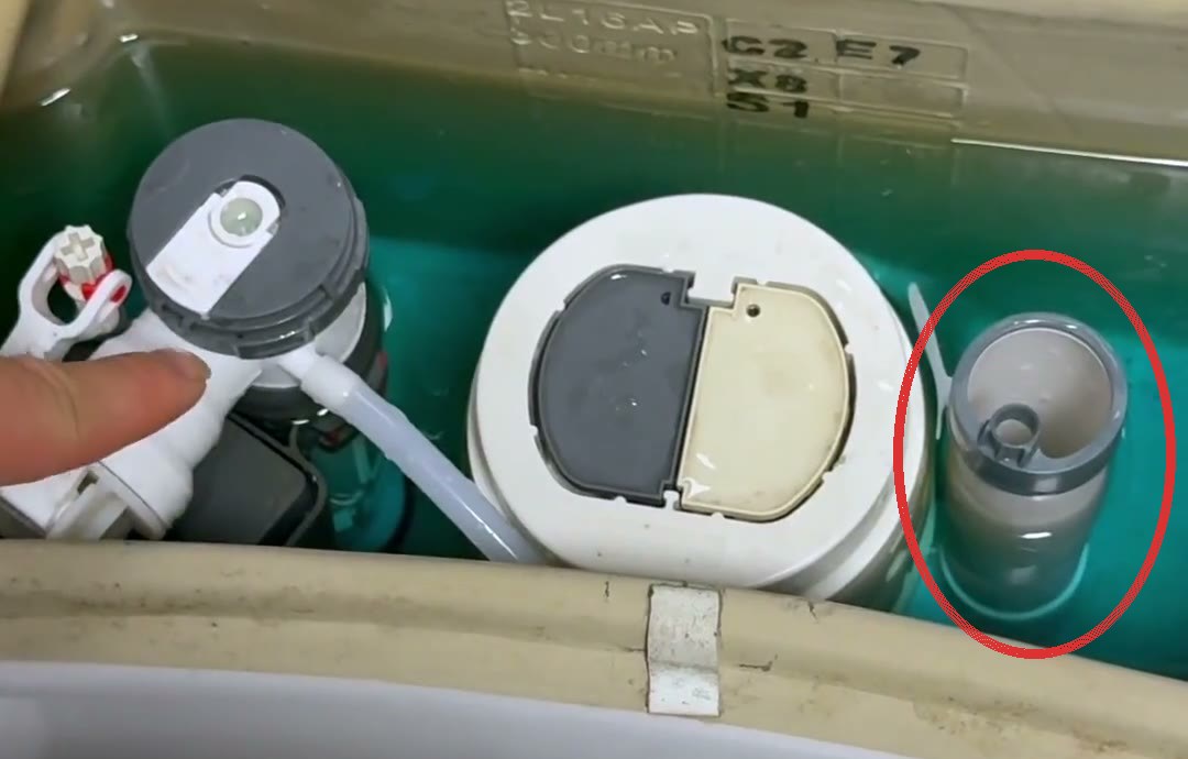 Inside a real tank, with the tall pipe where the hose ends circled